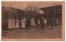Germany postcard - soldiers on train served refreshments by nuns? nurses? picture