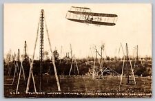 Postcard RPPC Antique Airplane The Post Master Viewing His Oil Property picture