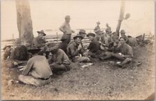 1910s WWI Military RPPC Photo Postcard Soldiers / Eating on Ground / Mess Scene picture