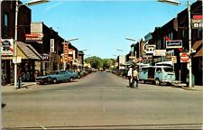 Postcard Business Street Scene in Spooner, Wisconsin picture