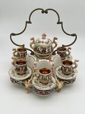 Capodimonte Porcelain Tea Set with Gold Accents and Hand-Painted Scenes picture