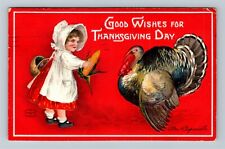 Thanksgiving Greeting-Clapsaddle Red Bonnet Girl Child Feeding Turkey Postcard picture