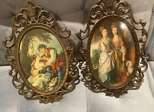 Pair of Ornate Brass Oval Picture Frames with pictures picture