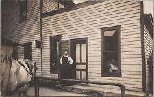 RPPC Postcard Woman looking Out of Doorway Waiting picture