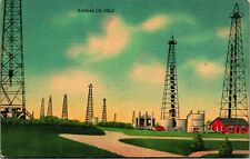 C.1930'S VINTAGE LINEN POSTCARD - KANSAS OIL FIELDS picture