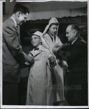 1957 Press Photo Dr. B.L. Corbett presents cadets with raincoats and hoods picture