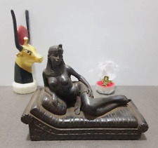Beautiful Queen Cleopatra Statue sitting on her throne from antique Stone picture