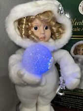 Vintage Heirloom Series Animated Snow Baby Girl Lights Up Christmas Motionette picture