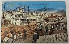 1941 Loading Cotton On The Riverfront Onto Boat Postcard picture