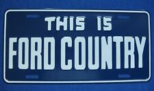 THIS IS FORD COUNTRY - dealership vanity booster license plate tag - BRAND NEW  picture