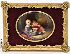 Famous Berlin porcelain plaque of two children sharing a picture book. late 19th picture