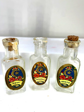 Precious  Trio of antique perfume bottles.  Ambre, Rose, Patchouli.   c. 1910s. picture