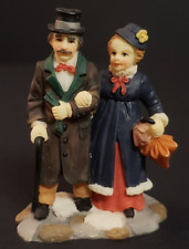 Holiday Time Owell Christmas Village Man Woman Couple Walking picture