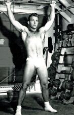 Young jock lifting weights in the basement, gay man's collection 4x6 picture