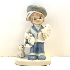 Vintage Enesco Hand Painted Boy With Sailboat & Dog Figurine Blue and White picture