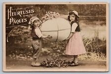 RPPC Happy Easter Adorable Children Holding Oversized Egg Floral Photo Postcard picture