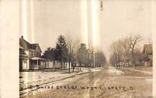 WEST LIBERTY Ohio postcard RPPC Logan County East Baird Street picture