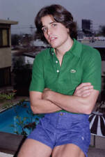 Peter Barton sits arms crossed wearing a green Lacoste polo shirt - Old Photo picture