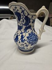 blue and white pitcher antique vintage.  picture