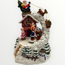 The San Francisco Music Box Company Santa in Sleigh Moving Ice Skaters picture