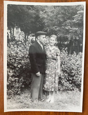 Affectionate gentle man with a girl in the park. Vintage photo picture