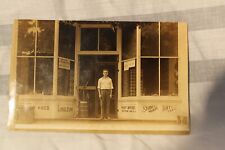 1905 Antique postcard/photo young man in front of the General Store. 3.5