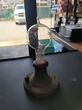 Antique Thomas Edison Light Bulb With Power Base picture