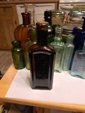  NICE 1890'S AMBER EMBOSSED AND LABELED CURE Patent Medicine Bottle  picture