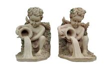 vintage earthenware elegant pair of roman style cherab book ends. picture