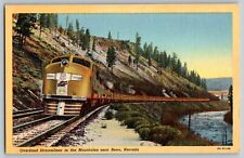 Reno, Nevada - Overland Streamliner Train in the Mountains - Vintage Postcard picture