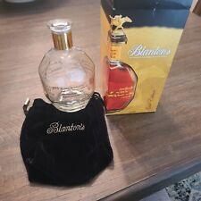 Empty Blanton’s Gold Bottle Unrinsed with Gold Horse Stopper picture