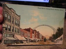 G5 Old MARIETTA OHIO Postcard Front Street Downtown Stores Awning Arch Streetcar picture
