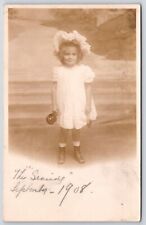 1908 Young Girl Photo Holding A Bottle Smiley Face Antique Posted Postcard picture