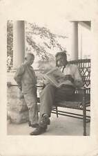 Vintage RPPC Father & Son reading The Literary Digest Magazine Photo Postcard picture