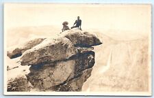 POSTCARD RPPC Couple Sitting on Overhanging Rocks Waterfall Background 1907-14 picture