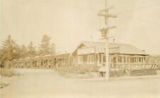 1920s Roadside Log Cabin Tourist Court RPPC Photo Postcard 22-1252 picture