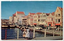 Women on the Waterfront Busy Street View Coca Cola Curacao 1950s Posted Postcard picture