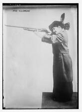 Miss V.C. Carson shooting a Winchester Model 1897 shotgun,February 13,1914 picture