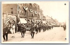 Postcard WW1 Parade? Military Soldiers Busy Street Scene (two holes) RPPC T110 picture