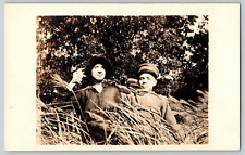 RPPC Postcard~ Young Woman & Soldier In Tall Grass/ Brush picture