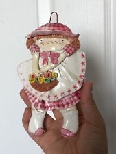 cute curly hair girl in a pink outfit flower basket wall hanging clay sculpture picture