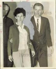 1966 Press Photo Judith Bradley, escorted by police. - hpa85963 picture
