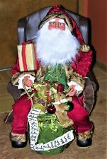 LARGE SANTA RELAXING IN HIS FAVORITE CHAIR picture