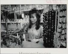 Press Photo Mindy Taing of Cheng's Trading Inc.'s store at Bergenline Ave., N.J. picture