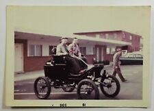 1961 Two Men Riding in Horseless Carriage at Hotel Snapshot Photo 2 1/2 x 3 1/2 picture