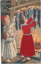 EMBOSSED SILK CLOTHES & BOW A MERRY CHRISTMAS POSTCARD 1908 picture