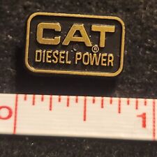 Small Plastic CAT Diesel Power Black and Gold Lapel Pin hat picture