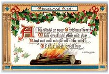 1909 Christmas Joys Holly Berries Logs Fire Embossed Tuck's Antique Postcard picture