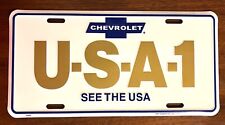 1960s VINTAGE-NEW CHEVROLET USA-1 EMBOSSED METAL LICENSE PLATE SEE THE USA CHEVY picture