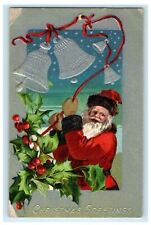 c1910 Christmas Holly Berries Santa Claus With Bells Embossed Antique Postcard picture